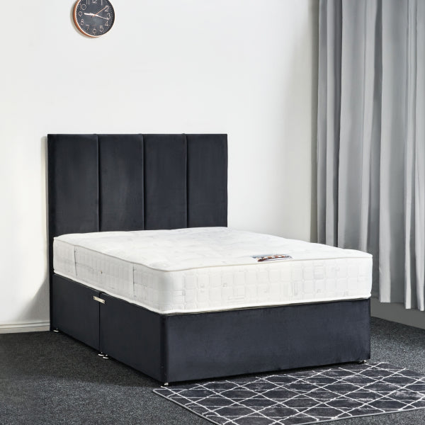 Bed with black upholstered headboard and white mattress in a room setting.

Osaka Divan Bed detail - Premium UK-made divan with mattress options