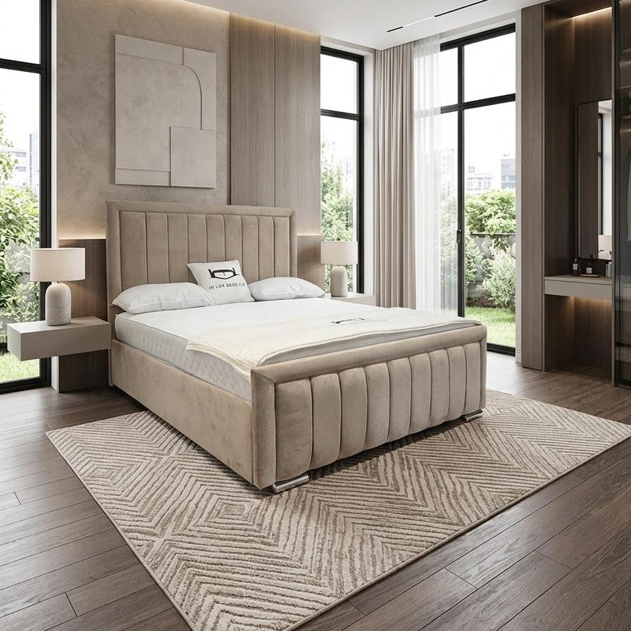 Modern bedroom with a large bed, side tables, and large windows.