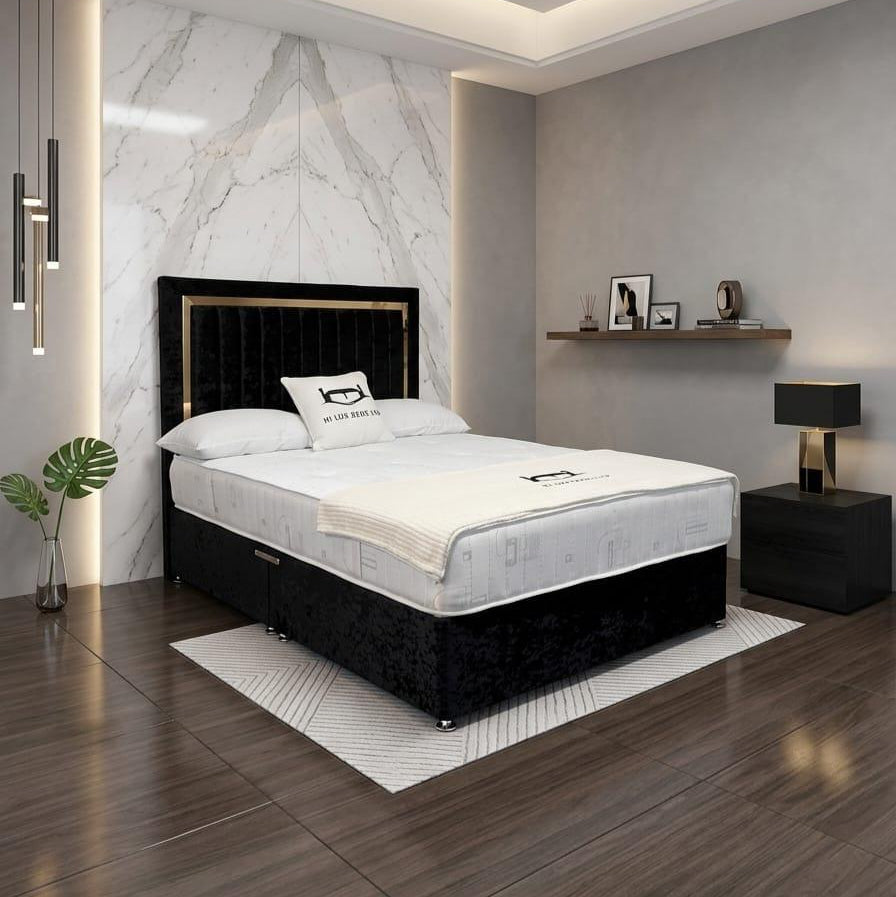 Modern bedroom with a black bed, marble wall, and wooden floor.