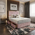 Modern bedroom with pink upholstered bed, nightstands, and artwork on the wall.