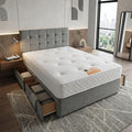 Modern bedroom with a gray upholstered bed and large windows.