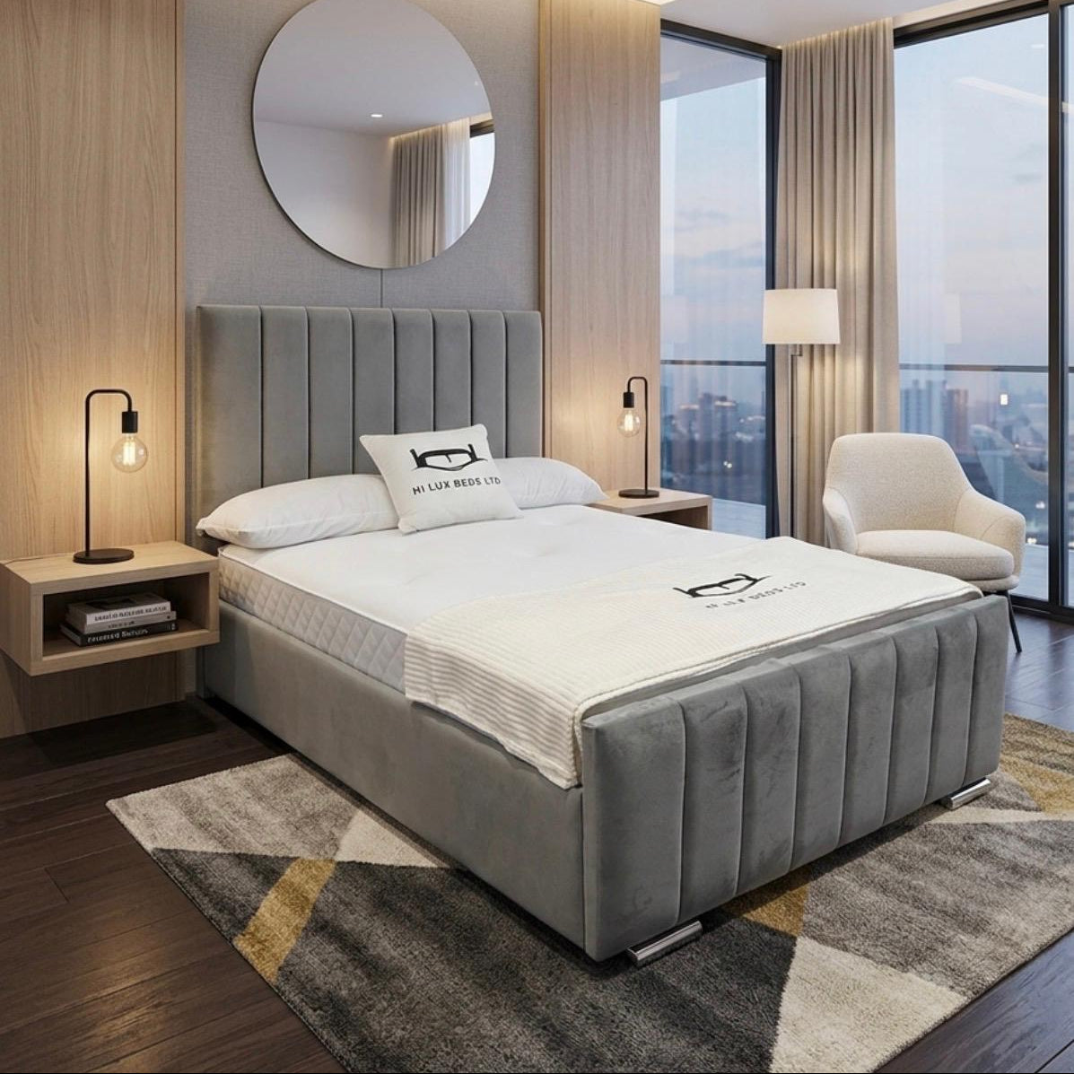 Modern bedroom with gray upholstered bed, nightstands, and a cityscape view.