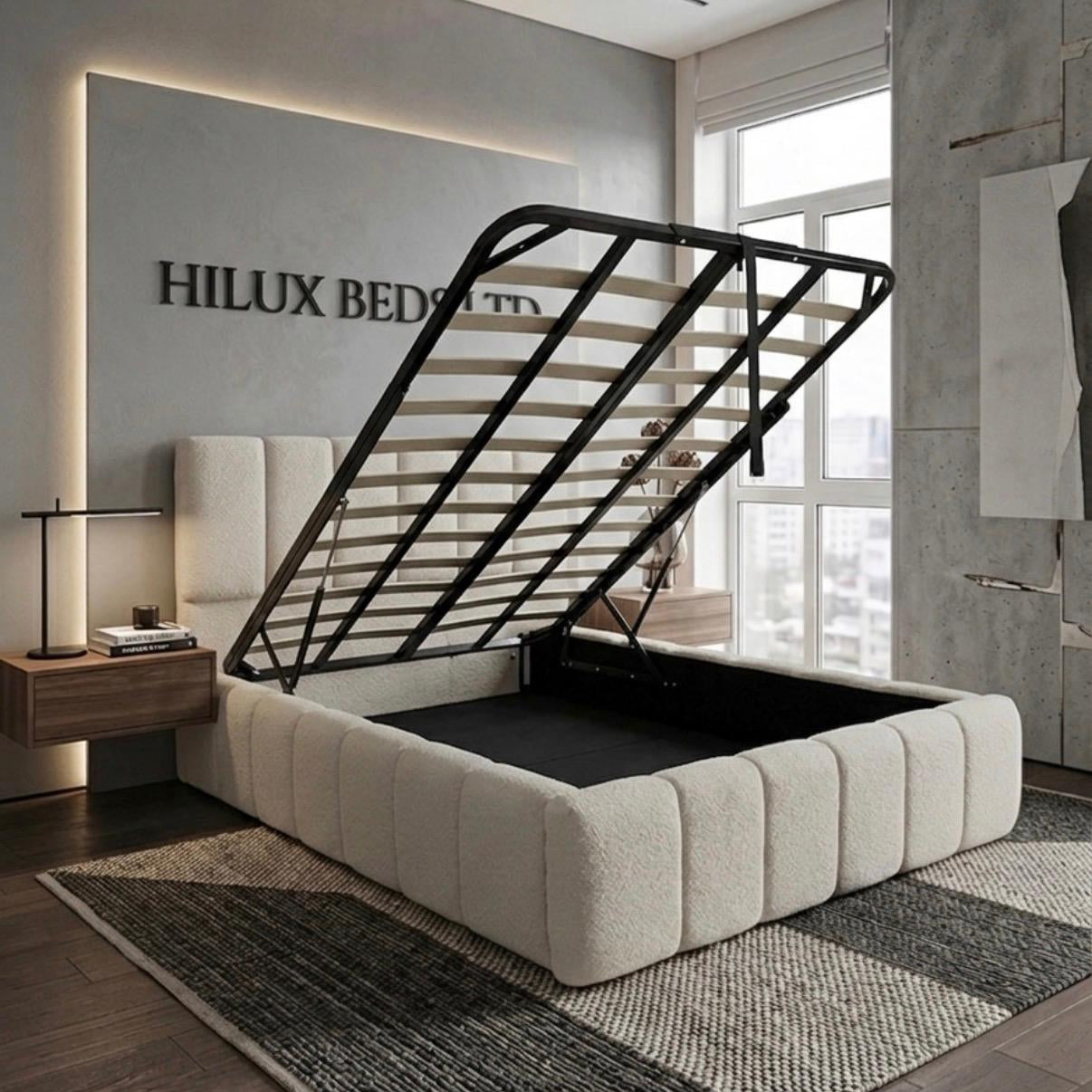 Modern bedroom with a black metal bed frame and white upholstered bed in a well-lit room.