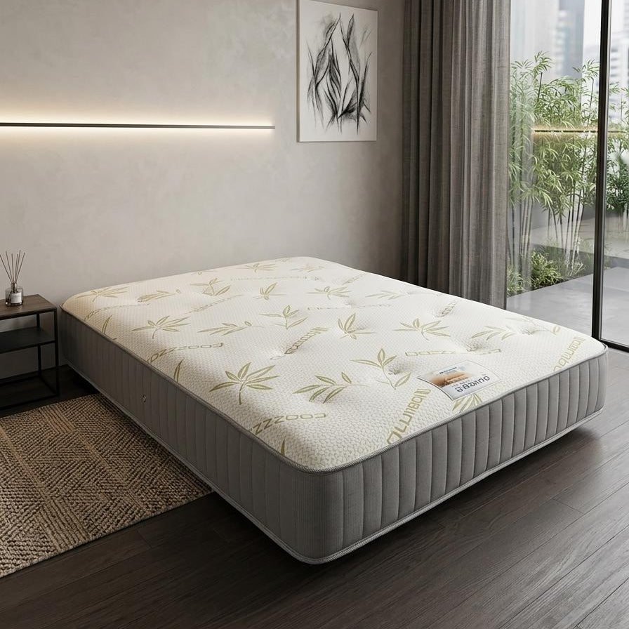 Mattress on a bed in a modern bedroom with large windows and decorative elements.