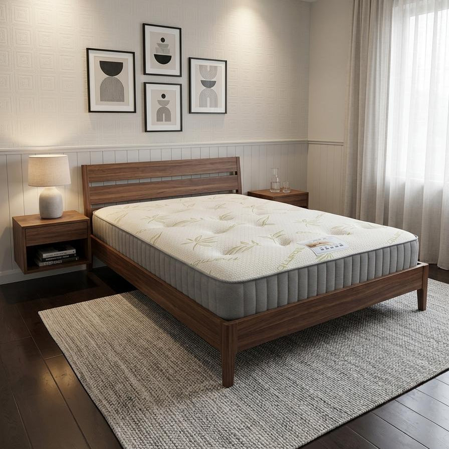 Bedroom with a wooden bed frame and mattress, nightstands, and framed art on the wall.
