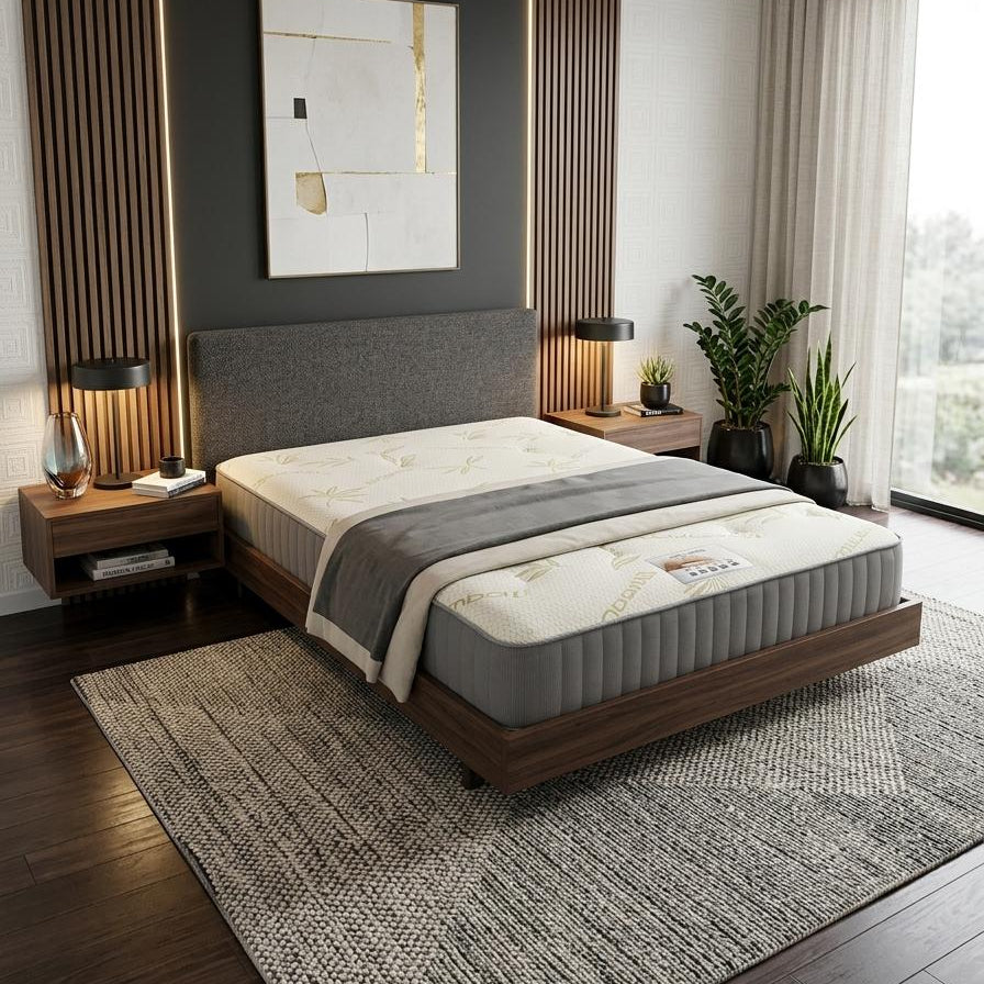Modern bedroom with a bed, nightstands, and decorative elements.