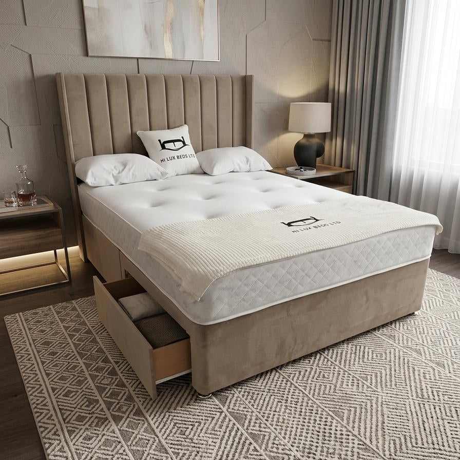Beige upholstered bed with white mattress in a bedroom setting