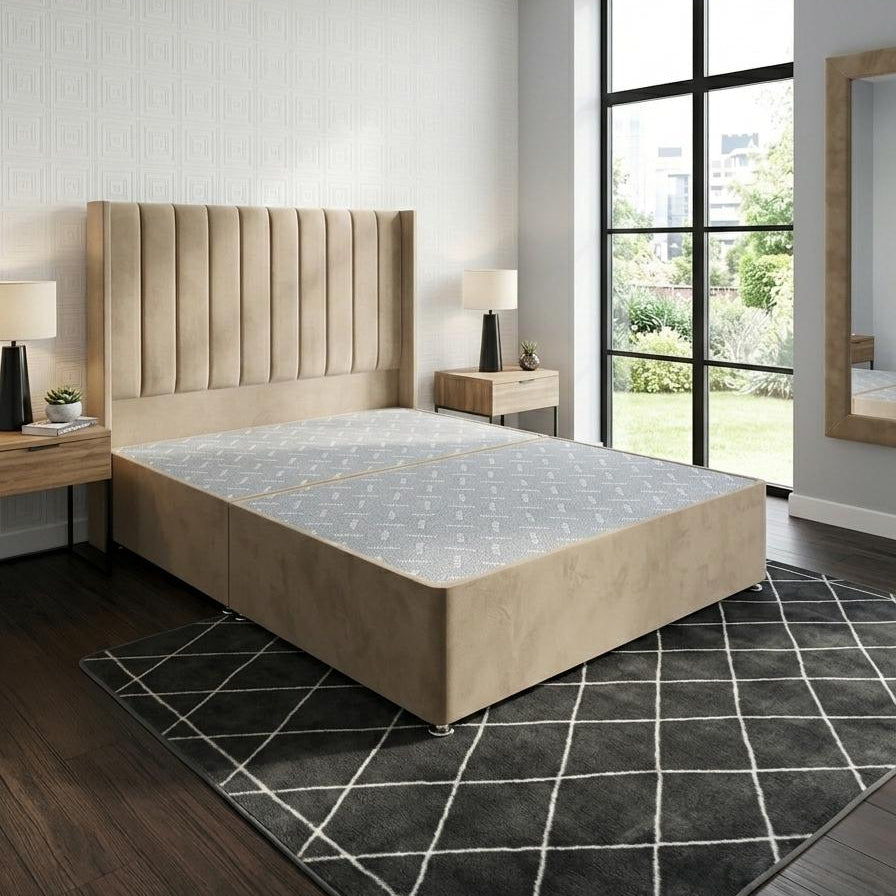 Beige upholstered bed in a modern bedroom with a large window.