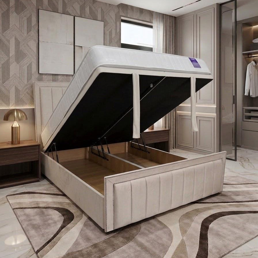 A high-end upholstered lift-up storage bed in a modern bedroom setting, shown with its gas-lifted frame raised to reveal the storage compartments underneath.