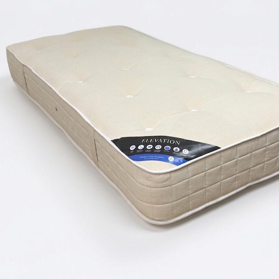 Beige mattress with brand logo on a white background